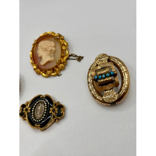 111 - Two Gold Coloured Cameo Brooches Along With Two Decorative Gem Set Brooches, Largest 5cm x 4cm.  (4)