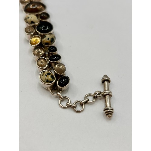 117 - Sterling Silver Stamped 925 Mixed Agate Stones Bracelet. 21cm Link To Link, 56.23Grams.