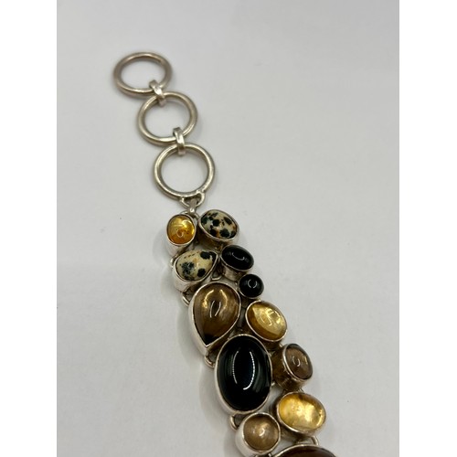 117 - Sterling Silver Stamped 925 Mixed Agate Stones Bracelet. 21cm Link To Link, 56.23Grams.