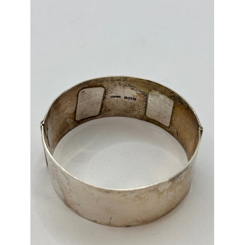 123 - Decorative Silver Hallmarked Heavily Engraved Pinch Bracelet. 10cm x 3cm, 37.06Grams.