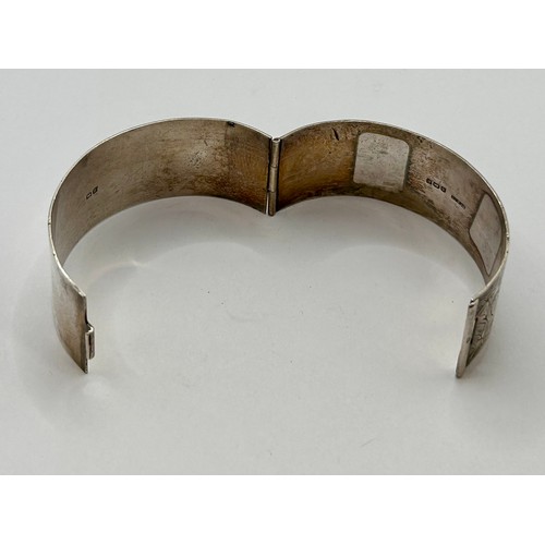 123 - Decorative Silver Hallmarked Heavily Engraved Pinch Bracelet. 10cm x 3cm, 37.06Grams.