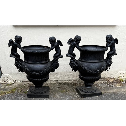 6 - A Pair Of Large Very Heavy Cast Iron Cherub Decoration Garden Planters. 85 x 93 cms (2)
