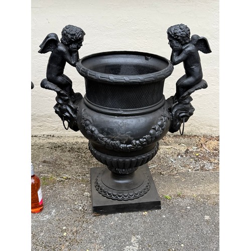 6 - A Pair Of Large Very Heavy Cast Iron Cherub Decoration Garden Planters. 85 x 93 cms (2)