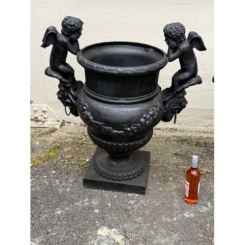 6 - A Pair Of Large Very Heavy Cast Iron Cherub Decoration Garden Planters. 85 x 93 cms (2)