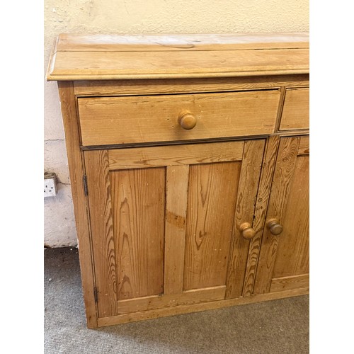 10 - Vintage Pine Cupboard With Two Drawers. 128 x 44 x 95 cms
