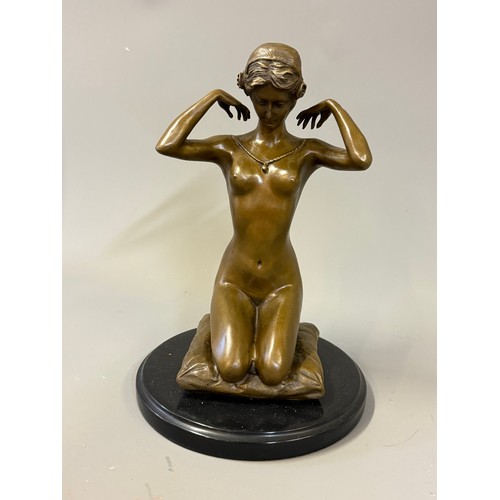 92 - Art Deco Style Bronze Nude Woman On A Cushion, Signature To Cushion. 29 cms High