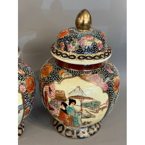 295 - Pair Of Hand Painted Satsuma Lidded Jars. 21 cms High (2)