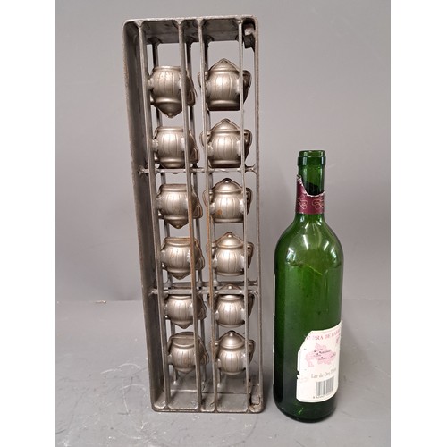Antique Hinged Chocolate Mould in the Form of 12 Tureens, 42cm x 14cm