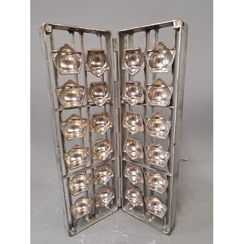 Antique Hinged Chocolate Mould in the Form of 12 Tureens, 42cm x 14cm
