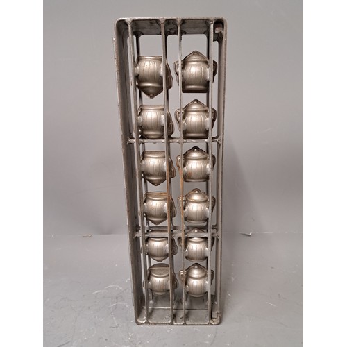 Antique Hinged Chocolate Mould in the Form of 12 Tureens, 42cm x 14cm