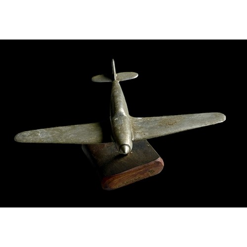 51 - WWII Trench Art Model Of A Hurricane
Size 13.5cm x 17cm x 8cm