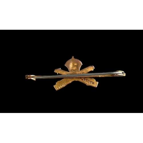 186 - Machine Gun Corps 9ct Sweetheart Brooch
Size 4.8cm x 1.5cm