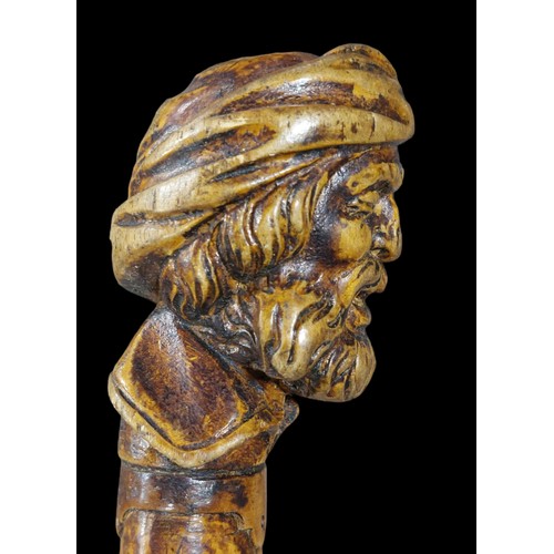 339 - Folk Art Walking Stick Depicting Turks Head