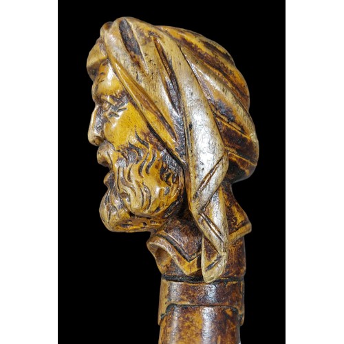 339 - Folk Art Walking Stick Depicting Turks Head