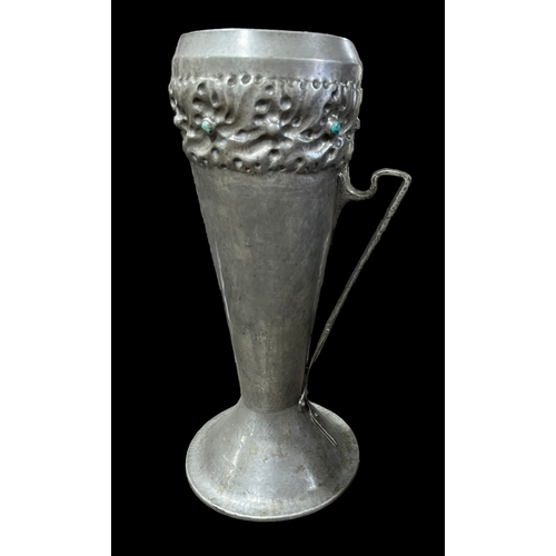 341 - Liberty & Co. Tudric Pewter Two Handled Vase With Turquoise Cabochons.
35.5 Centmetres Tall.