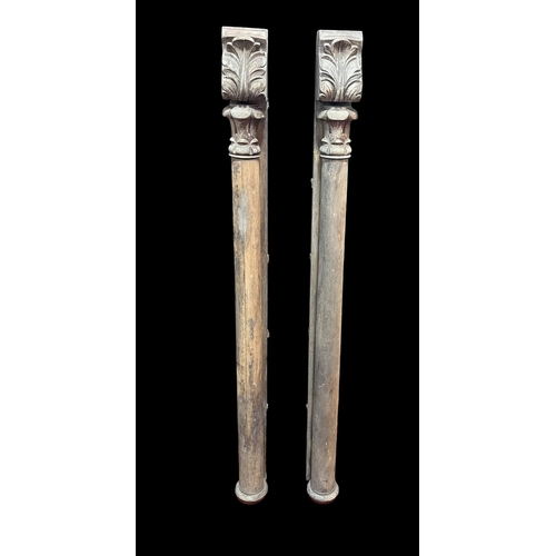 235 - A Pair of Wooden Columns 121cm Long