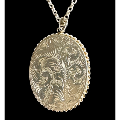 50 - A Large Silver Locket 5.3cm x 4.3cm & Chain 76.5cm