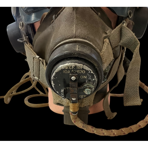 71 - A Second World War Leather RAF Flying Helmet , Bakelite ear pieces with Air Ministry Goggles