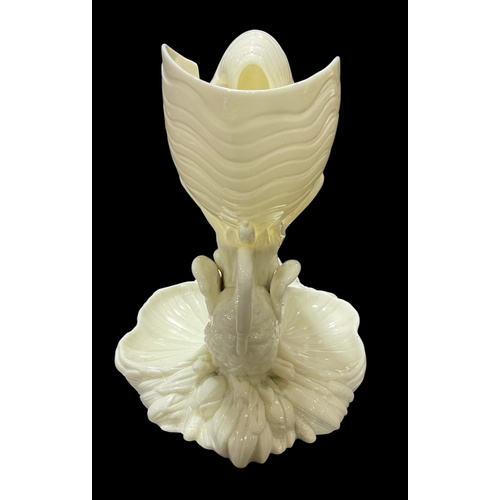 216 - Royal Worcester Nautilus Shell Supported by Bullrushes and Swan.Firing crack and small chip to base ... 