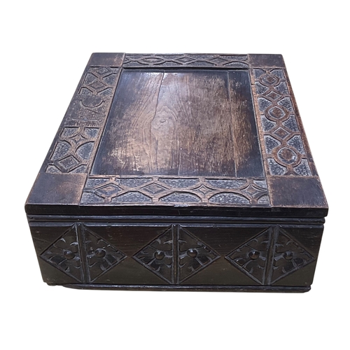 420 - A Heavily Carved Oak Bible Box  (part of the base missing).