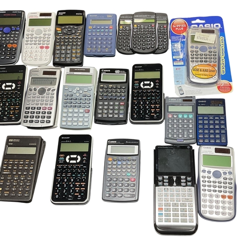102 - A Collection of 30+ Mostly Scientific Calculators .Casio, Sharp, Canon etc.