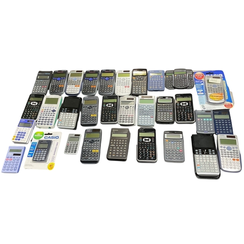 102 - A Collection of 30+ Mostly Scientific Calculators .Casio, Sharp, Canon etc.
