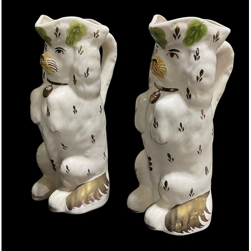 106 - A Pair Of Staffordshire Dog Style Pitchers Standing 25cm Tall