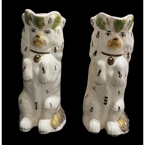 106 - A Pair Of Staffordshire Dog Style Pitchers Standing 25cm Tall