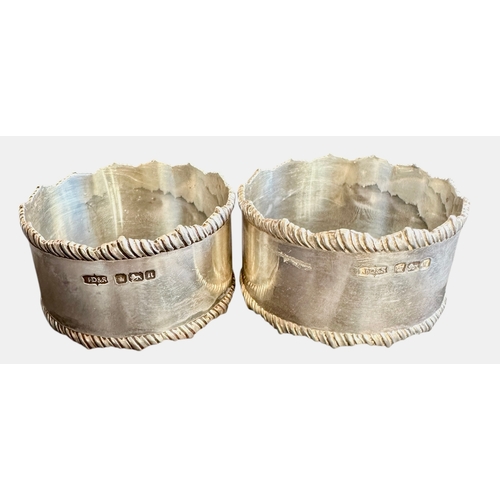 230 - Pair Of Silver Napkin Rings Weight 57g Size 2.5cm x 4.5cm
