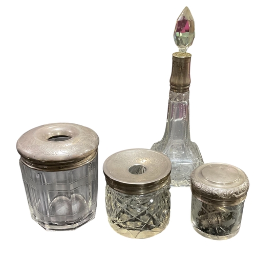 236 - A Collection of Cut- Glass Incl. Some with Silver Tops.