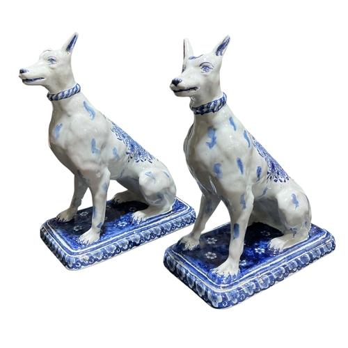 208 - A Pair of Delft Blue & White Dogs with Floral Decoration Marked for Jacobus Adriansz Halder
