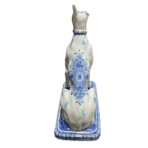 208 - A Pair of Delft Blue & White Dogs with Floral Decoration Marked for Jacobus Adriansz Halder