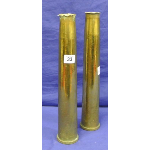 18 - Pair of old military brass shells