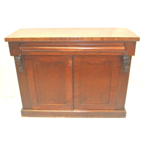 36 - Edwardian mahogany side cabinet with frieze drawer, paneled doors, shelved interior, on plinth