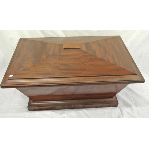 56 - Georgian mahogany sarcophagus shaped wine cooler with lift-up lid, on oblong base