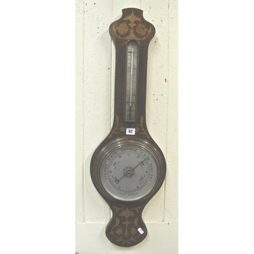 58 - Edwardian inlaid mahogany wheel barometer with circular brass farmed dial and thermometer