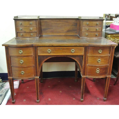60 - Edwardian inlaid and crossbanded mahogany walnut desk with brass rail, bowed drawers with brass hand... 