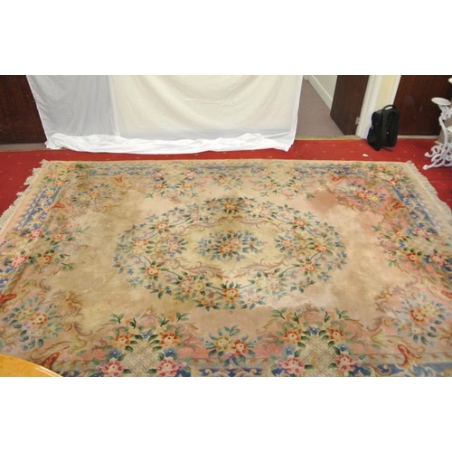 79 - Floral decorated carpet with foliate borders 152 x 108ins