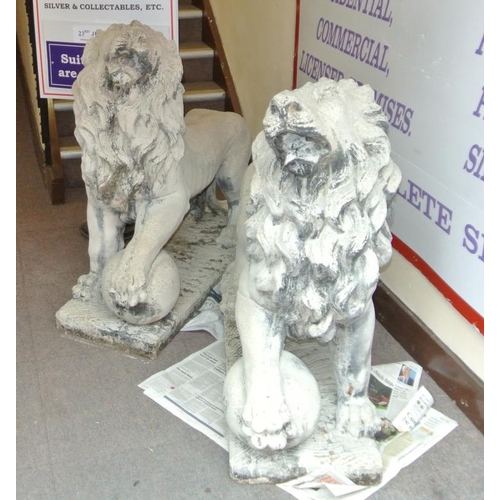 150 - Pair of large stone garden statues of the classical Medici Lions, standing with paws on balls or glo... 