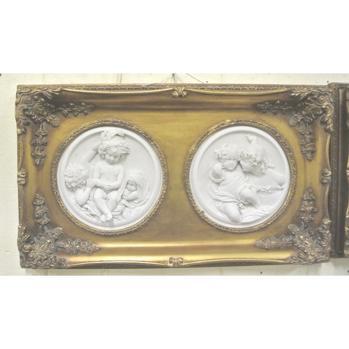 205 - Gilt framed double wall plaque with circular figure decorated plaques with coins inset verso