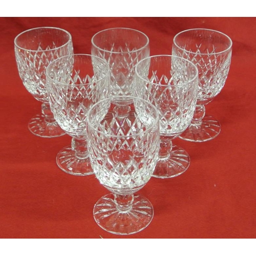 63 - Set of 6 Waterford crystal cut glass stemmed  wine glasses with diamond decoration and circular base... 