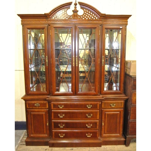 130 - Modern mahogany breakfront display cabinet with arched frieze, astragal glazed doors, shelving, draw... 