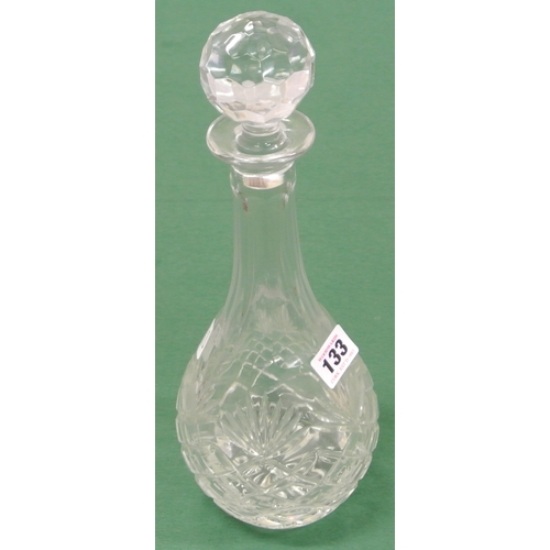 133 - Crystal cut glass baluster shaped decanter with faceted neck and stopper