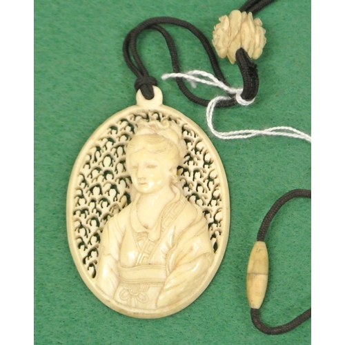 167 - Oriental carved Ivory pendant