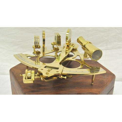 129 - Ornate brass ships adjustable sextant in carrying case