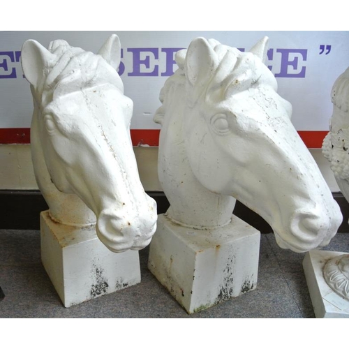 117 - Pair of Victorian design cast iron horse heads on square bases