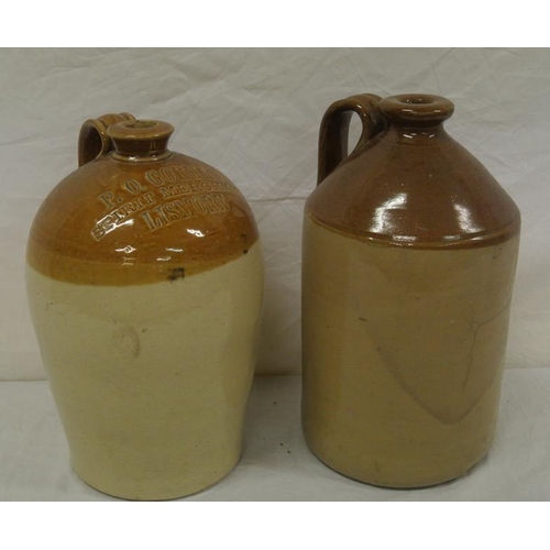 62 - 2 earthenware measures with shaped handles