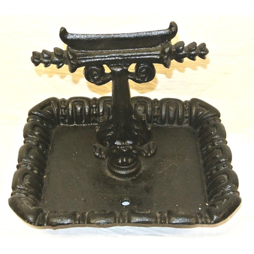 78 - Georgian style cast iron boot scraper with foliate decoration