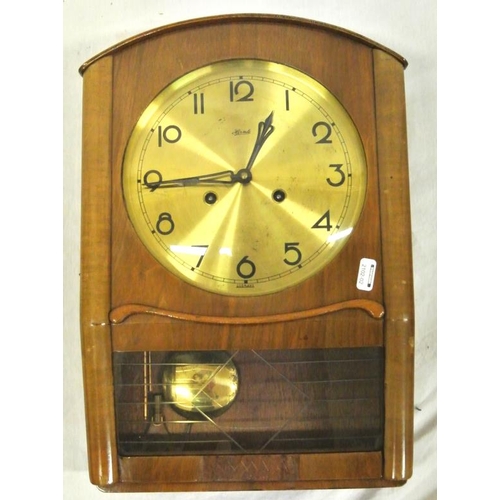 23 - German Art Deco wall clock with circular brass dial and pendulum