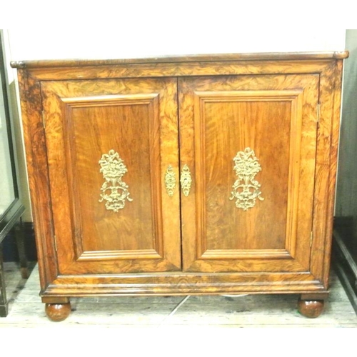 34 - Edwardian walnut side or television cabinet with lift-up lid, adjustable shelving, paneled doors wit... 